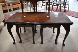 A reproduction coffee table with two nesting tables under, width approx. 95cm
