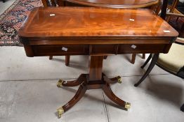 A nice quality reproduction Regency fold over tea table, width approx. 84cm