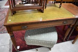 A 19th century leather topped mahogany writing table, of rectangular form with inset leather