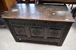 A period oak kist of nice proportions, having triple carved panels, width approx. 98cm