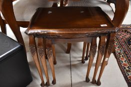 A vintage nest of three tables