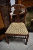 A late 19th or early 20th Century mahogany slat back dining chair