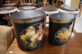 A pair of decorative hat boxes