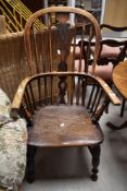A 19th Century ash Windsor style carver chair