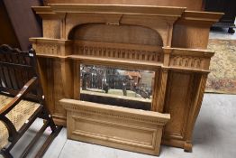 An unfinished oak sideboard mirror back, in the Victorian style with carved nulled decoration