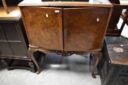 A mid 20th Century walnut Epstein style cocktail cabinet, width approx. 93cm