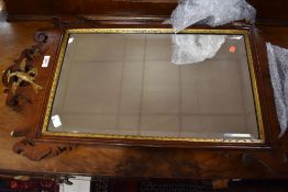 A 19th Century Chippendale style wall mirror (af) having gilt heightened decoration, approx. 78 x