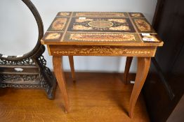 A vintage sewing table in the Continental style