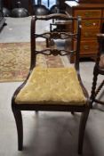 A Regency style mahogany rail back dining chair