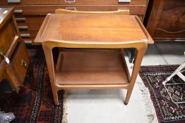 A vinatge teak and ply tea trolley