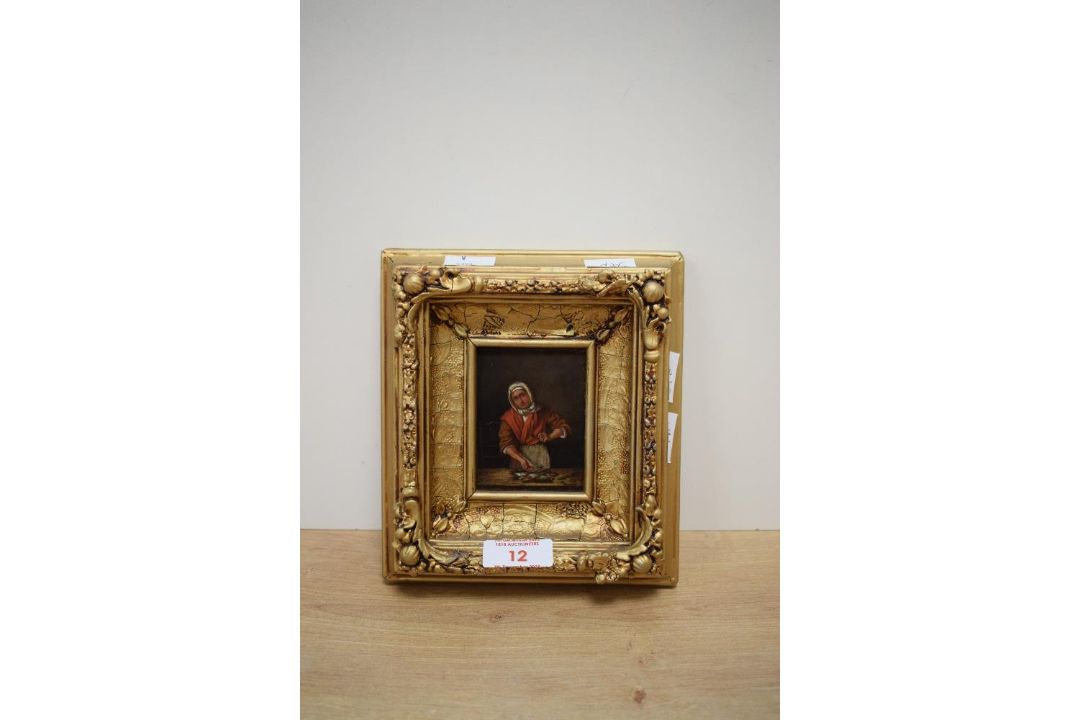 A small 19th century type oil on board/panel, a continental woman preparing fish, unsigned, within a - Image 2 of 3