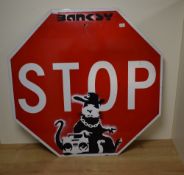 An interesting unauthorised 'BanksyLand' Banksy Retrospective American stop sign, (painted metal