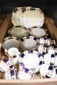 A large Warwick China part tea service having blue and gilt decoration with rose swags (39).