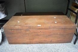 A traditional dark stained bedding box, possibly camphor wood, dimensions approx. W88 D52 H30cm