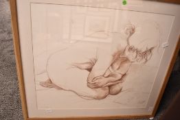 Two British contemporary female life studies, the first a pencil sketch of a woman undressing,