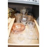 A collection of assorted glassware including a large crystal vase, a heavy vase with indistinct