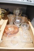 A collection of assorted glassware including a large crystal vase, a heavy vase with indistinct