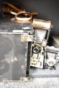 Two folding camera, one Ensign Autorange 16-20 folding camera, the other of unknown origin and a