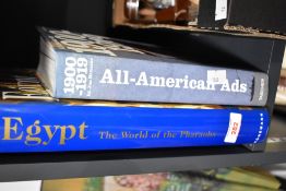 Two contemporary illustrated history books, titles include 'Egypt: The World of the Pharaohs' and '