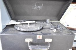 A Reka portable suitcase style turntable