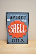 A cast Shell Spirit Oils plaque