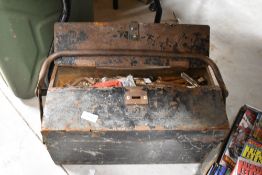 A cantilever tool box and contents