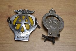 Two car badges. Royal East African Automobile Association L9257 and AA OL95942