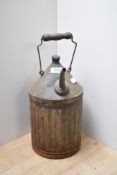 A vintage fuel can with spout
