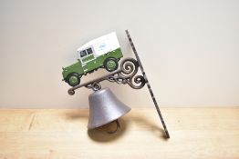 A cast Land Rover wall mounted bell