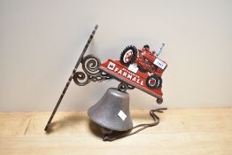 A cast McCormick Farmall wall mounted bell