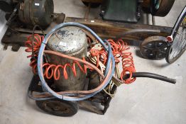 A portable electric compressor