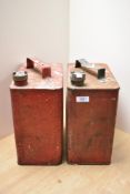 Two vintage fuel cans with brass caps