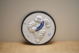 A cast Michelein plaque