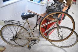 A Raleigh bicycle with spare tyre