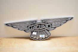 An alloy Jaguar sign