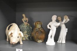 A quantity of 20th-century sundry figurines, to include a large pottery pig; a resin sitting monkey;