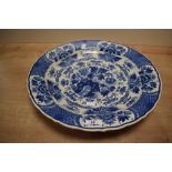 A large mid 20th-century De Koninklijke Porceleyne Fles Delft ware blue charger painted by W.M.G