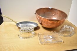 A mixed cookery lot to include a large Victorian Benham & Sons London hammered copper bowl, marked