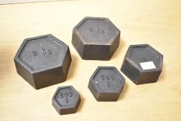 A set of 20th-century French iron graduating nesting weights, compromising of five hexagonal-