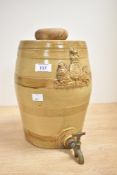 A Victorian salt-glazed stoneware spirit/whiskey barrel with a brass tap, featuring an applied,