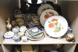 A selection of 20th-century French Quimper pottery by HB-Henriot, featuring a selection of folk-