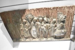 A large 20th-century African Tribal Art bronze cast or similar relief metal sculpture, featuring a