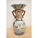 A large 19th/20th-century Chinese porcelain vase, of baluster form with a scalloped rim and