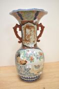 A large 19th/20th-century Chinese porcelain vase, of baluster form with a scalloped rim and