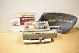A mid 19th-century Nippon Calculating Machine Corporation Busicom HL-21 calculator, with original