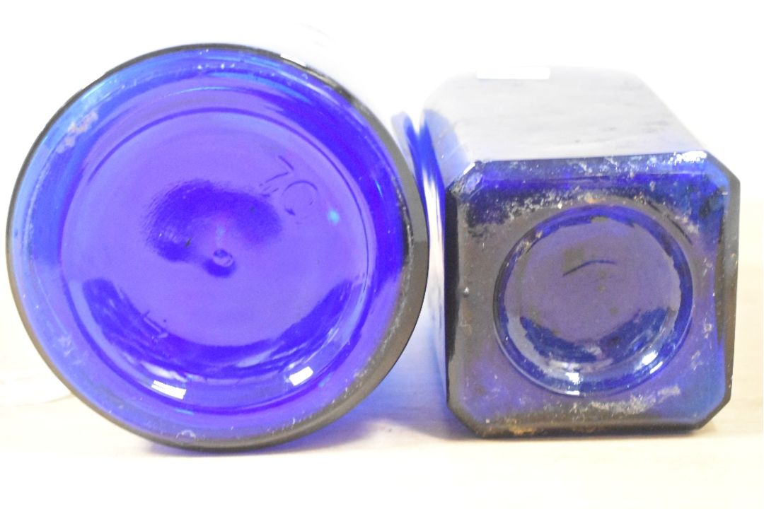 Two late 19th-century dark blue glass containers, to feature a bottle of J. Morgan and Sons 'White - Image 3 of 3
