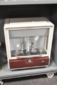 A mid 20th-century British Oertling 'Releas-o-Matic' Analytical Balance, partially dismantled and