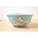 A late 19th century Chinese turqoise-glazed '100 Boys' bowl, featuring hand painted figures of