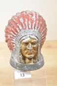A 20th-century painted and cast metal Guy Motors Native American head car mascot, marked to front,
