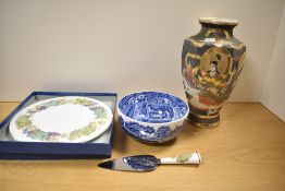 A 20th century Royal Worcester 'Vine Harvest' serving platter with cake server in original box; sold